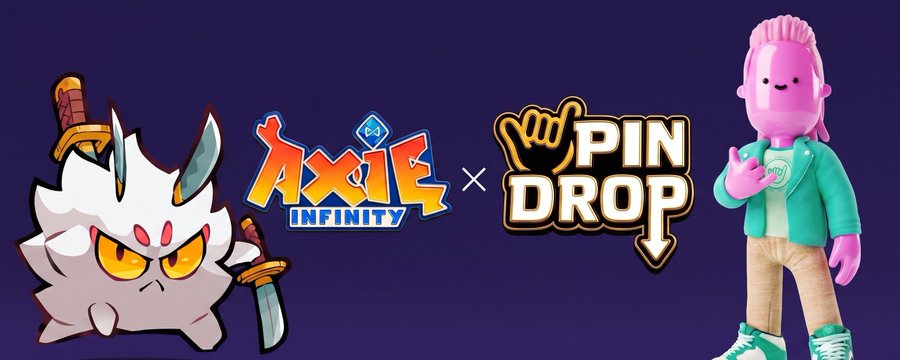 Promotional banner for a collaboration between Axie Infinity and Pin Drop, featuring a white horned Axie creature wielding swords next to the Axie Infinity logo and Pin Drop logo (with a pointing hand graphic), alongside a pink character from the Good Vibes Club, with text highlighting a 7-day takeover event.