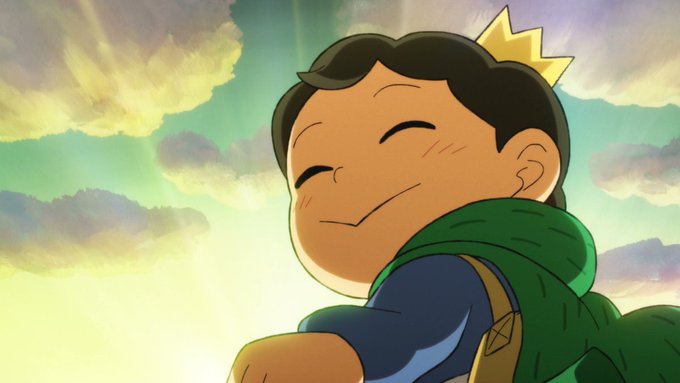 A cartoon character wearing a crown smiles warmly against a bright, cloudy sky, projecting confidence and optimism. The image complements the post's message about confidently taking initiative ("from the front") rather than waiting for signals, with the crowned figure symbolizing a proactive, winning mindset.