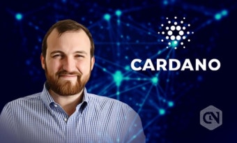 A bearded man is pictured beside the Cardano (ADA) logo against a blue network-themed background, with a 'CN' watermark.
