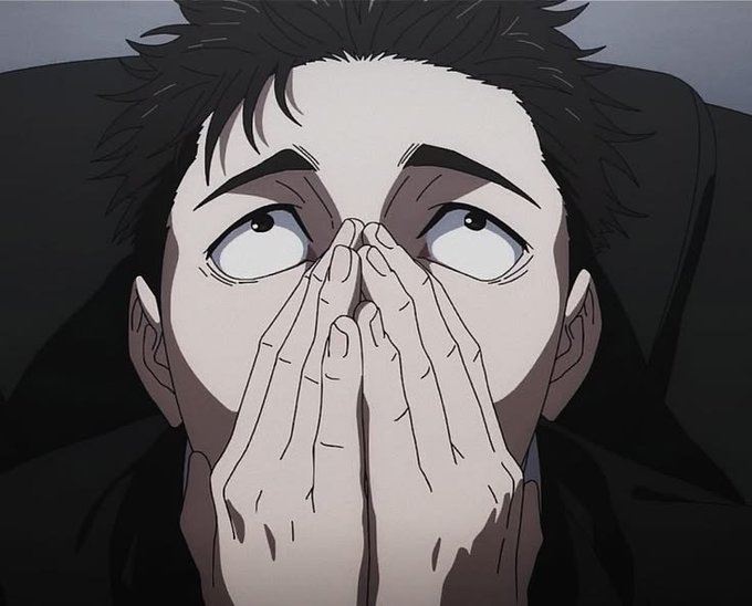 An anime character with messy dark hair and wide eyes covers his mouth with both hands in an expression of shock or anxiety.