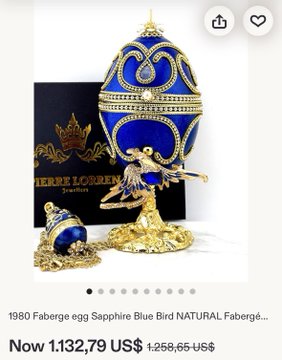 A luxury jewelry listing for a '1980 Fabergé egg Sapphire Blue Bird NATURAL' priced at $1,132.79 (discounted from $1,258.65 US$).