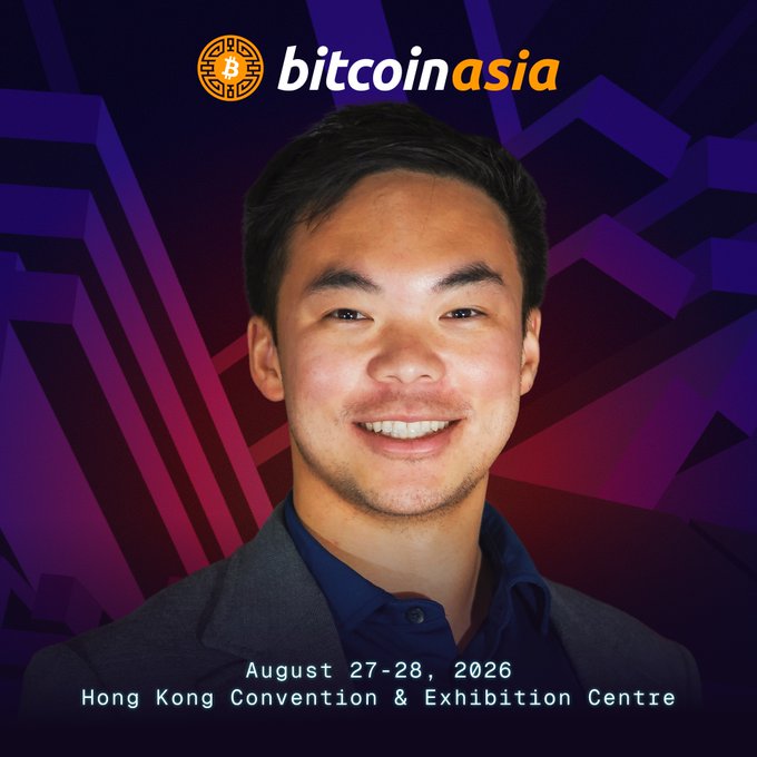A promotional graphic for the Bitcoin Asia conference featuring a smiling young man in a gray suit jacket against a purple geometric background, with the Bitcoin Asia logo at the top and event details reading 'August 27-28, 2026, Hong Kong Convention & Exhibition Centre' at the bottom.