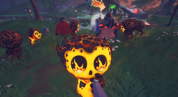 A screenshot from a video game showing a glowing lava-like character with large eyes surrounded by similar figures in a grassy outdoor area.