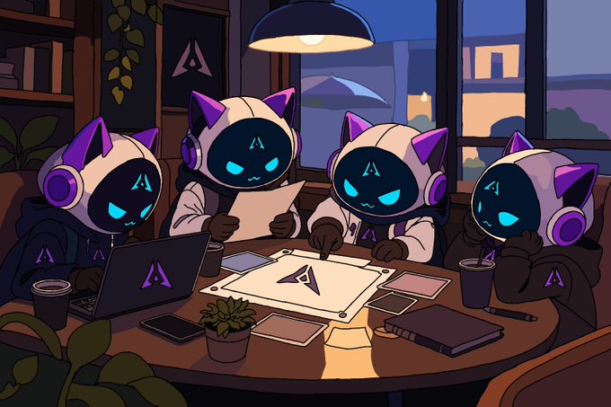An anime-style illustration of four hooded cat-like figures with glowing blue eyes and 'A' logos on their hoodies, gathered around a table working on a laptop and a blueprint in a cozy, plant-filled room.