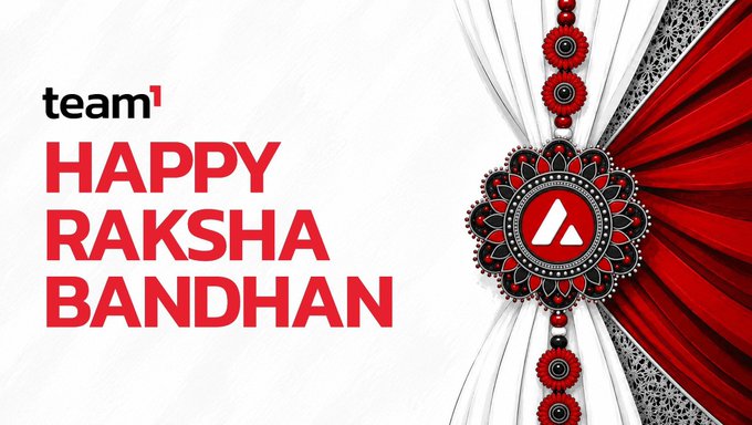 A graphic from 'team¹' reads 'HAPPY RAKSHA BANDHAN' in red text alongside a decorative red and black rakhi ornament on a white background.