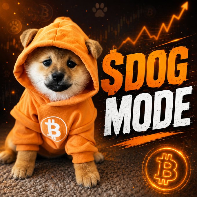 A Shiba Inu puppy in an orange Bitcoin-logo hoodie next to bold '$DOG MODE' text with a rising orange chart and Bitcoin symbols.