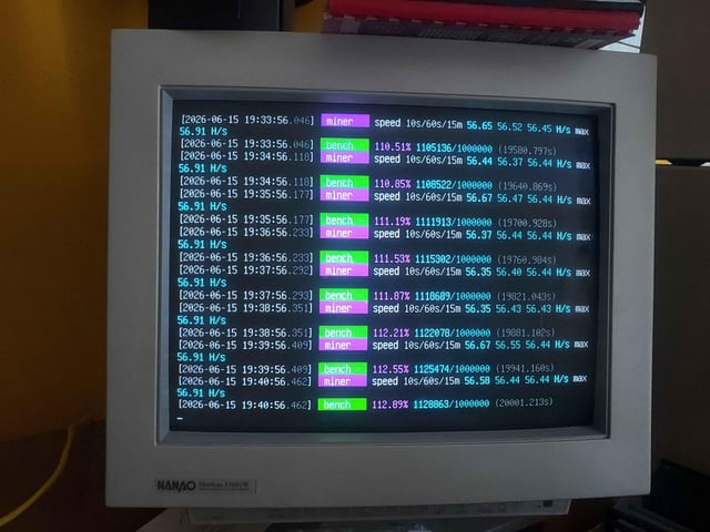 The image shows a computer monitor with a large screen displaying various data, including speed information for different networks. There are multiple lines of text and numbers displayed across the screen, suggesting that this could be an XMRig Benchmark or similar type of software. The focus on what is in the image and how it relates to the post indicates that the viewer might be interested in understanding the performance of a specific network or comparing different networks' speeds.