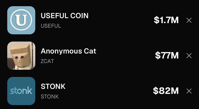 The image displays a cryptocurrency tracking interface showing three tokens: **USEFUL COIN (USEFUL)** at $1.7M, **Anonymous Cat (ZCAT)** at $77M, and **STONK (STONK)** at $82M, each with an "X" removal option. This aligns with the post highlighting the poster's Stonk coins performing decently, while noting the token pairings (USEFUL/USELESS, ZCAT/ZEC) and identifying Stonk as the main launchpad for these holdings.