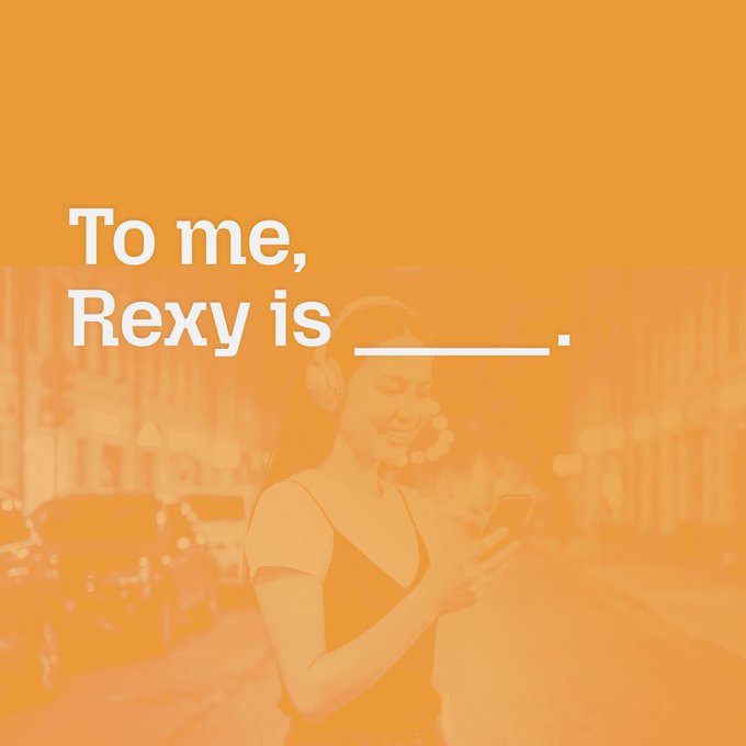 The image shows a smiling young woman with long dark hair wearing headphones and looking at her phone, set against an orange-tinted city street background, with the prompt text "To me, Rexy is _______." overlaid in white. The graphic serves as a visual prompt for a social media contest inviting users to complete the sentence about what "Rexy" means to them.