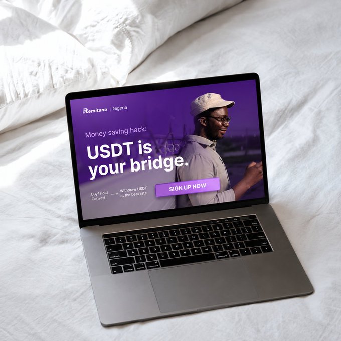 A laptop displays a Remitano Nigeria advertisement with the text "Money saving hack: USDT is your bridge. Withdraw USDT at the best rate. SIGN UP NOW." This visual promotes saving and sleeping better, as mentioned in the accompanying post, by offering convenient USDT services.