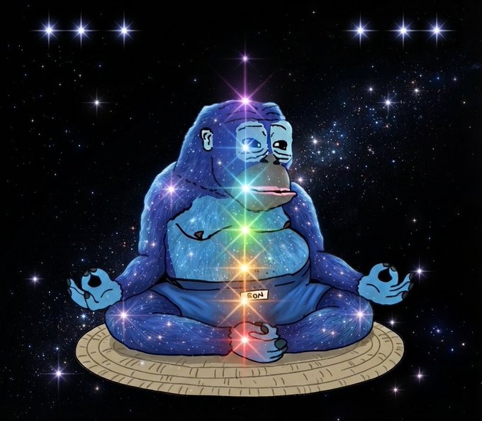 An illustration of a blue gorilla in a meditative lotus pose against a starry space background, featuring seven glowing chakra points aligned along its body.