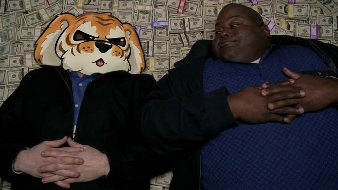 Two men recline against a massive pile of cash, with one person's face obscured by a cartoon bulldog emoji, visually reinforcing the bold declaration of extreme wealth.