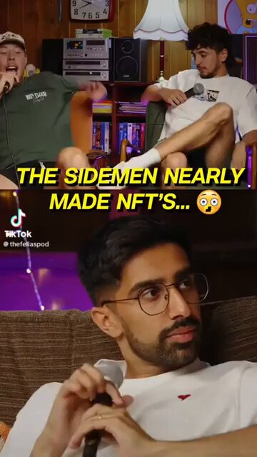 The image features two men sitting next to each other with one of them holding a microphone while the other man looks at him. The background shows a couch and a chair, suggesting that they are in a living room setting. There is also text on the image that reads "Without the Sidemen, KSI would have launched a scam NFT's... Say what you want but they definitely helped bring him back to earth, something KSI needs". This message seems to be related to the post about The Sidemen Nearly Made NFTs' and could be interpreted as an attempt to warn viewers against potential scams or schemes involving NFTs.