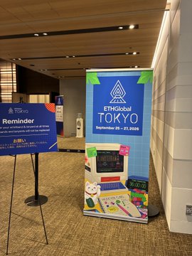 A convention center hallway featuring a banner for 'EH!Global TOKYO' dated 'September 24 - 27, 2026', alongside a 'Reminder' sign on an easel.
