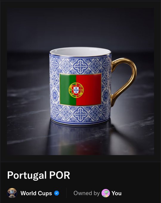 The image features a mug with a Portugal flag design, placed on a black surface. The mug has a gold handle and a blue rim, giving it an elegant appearance. The background of the image is dark, which contrasts nicely with the vibrant colors of the mug's design. The text "Portugal POR" can be seen in the image, indicating that this mug is related to or inspired by Portugal.