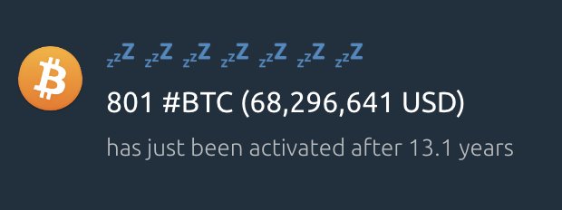 A graphic showing a Bitcoin (₿) logo with sleep emojis and text stating "801 #BTC (68,296,641 USD) has just been activated after 13.1 years" on a dark blue background.