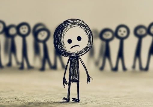 A hand-drawn stick figure with a sad face standing in the foreground while multiple blurred smiling stick figures appear in the background.