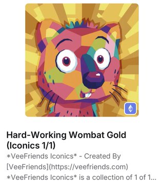 A colorful pop-art style icon of a wombat face is displayed above the text 'Hard-Working Wombat Gold (Iconics 1/1)' from the VeeFriends Iconics collection.