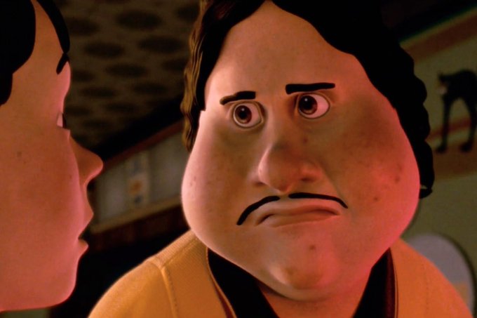 An animated character with a wide, round face and a small mustache stares blankly with a disappointed expression, perfectly capturing the feeling of having an empty portfolio while everyone else cashes out to enjoy life.