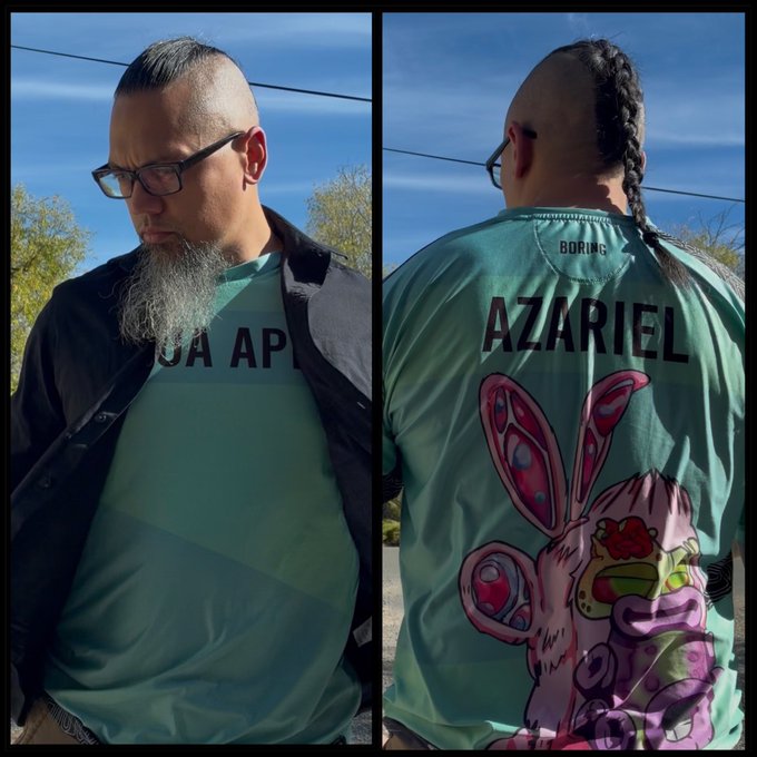 A man with a mohawk and braid is shown from front and back wearing a teal 'AZARIEL' baseball jersey featuring a colorful bunny graphic on the back.