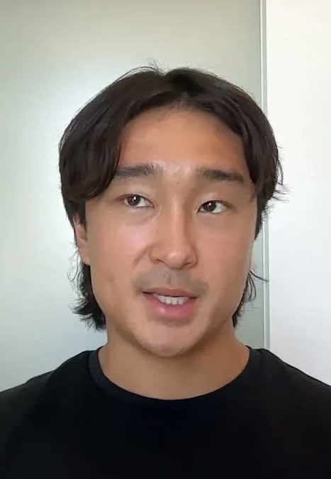 A young man with dark hair and a black shirt looks directly at the camera with a neutral expression. The image does not visually depict FOMO or terminal volume statistics, so it appears to be a personal reaction shot accompanying the news about FOMO's growing market share.