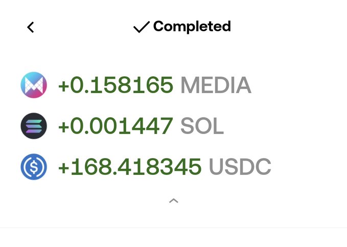 A completed crypto transaction showing gains: +0.158165 MEDIA, +0.001447 SOL, and +168.418345 USDC.