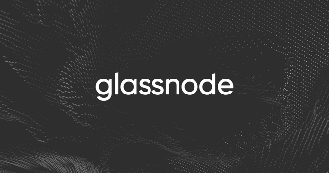 The Glassnode logo is displayed in white lowercase text against a dark background featuring a subtle wave-like pattern of light dots.

This image serves as the branding header for Glassnode, a blockchain analytics platform whose on-chain data is cited in the post to support the warning that Bitcoin's price recovery toward $65K lacks underlying network demand, as evidenced by weak active addresses, transfer volume, and fee generation.
