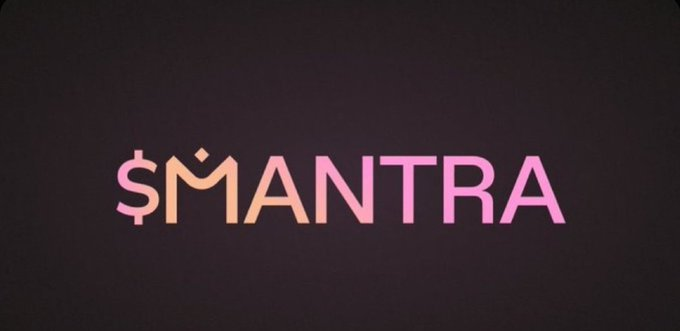 The image features a logo for MANTRA, which is a cryptocurrency wallet service. The logo consists of the word "MANTRA" written in pink and orange colors against a black background. Below the logo, there's text that reads "just migrated its entire token got VARA licensed and is tokenizing Dubai real estate and people are still bringing up the April crash like @MANTRA_Chain doesn't exist anymore the cope is crazy". The image seems to be related to the MANTRA cryptocurrency wallet service or a discussion about it.