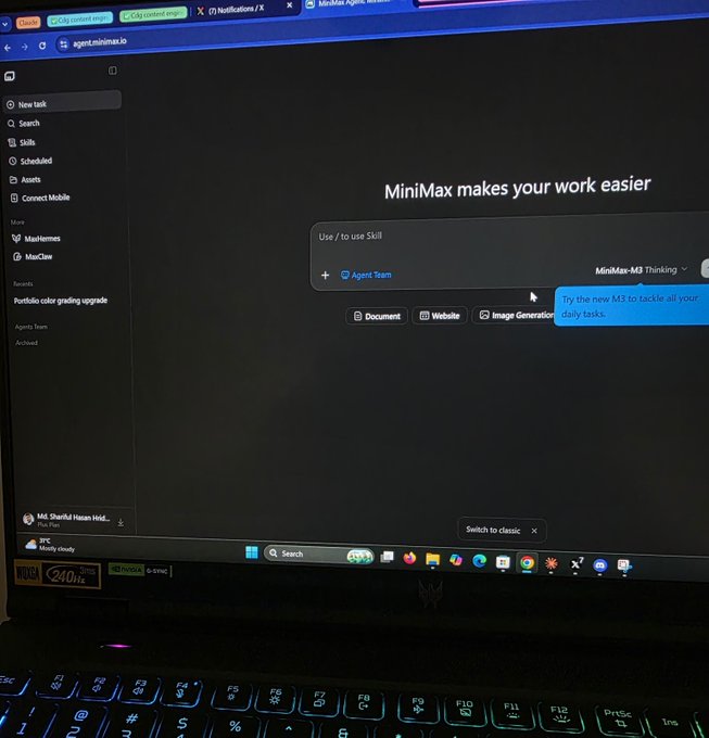 A laptop screen displaying the MiniMax interface and the message 'MiniMax makes your work easier', with a Windows taskbar visible at the bottom.
