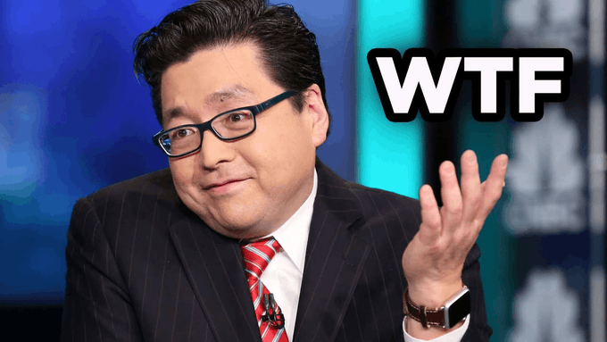 A television news commentator in glasses, suit, and red striped tie making a confused expression with the text 'WTF' overlaid next to his raised hand.