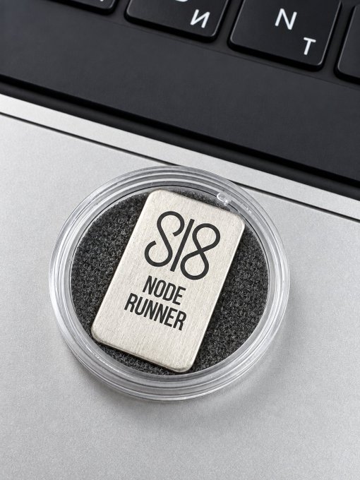 A silver "Sl8 Node Runner" branded token sits in a clear protective case next to a laptop keyboard, visually tying to the post's discussion of Sl8's flexible XRP staking terms ranging from 18% APY on the 7-day option up to 62% APY on longer commitments.