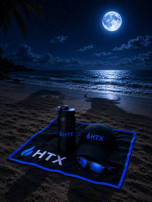 Under a glowing full moon on a quiet beach, an HTX-branded tumbler, cap, sunglasses, and towel are arranged together, with the "HTX" logo prominently displayed in blue. The moonlit setup mirrors the post's "moon out, conviction in" sentiment, pairing the brand's gear with nighttime stillness to evoke steadfast belief.