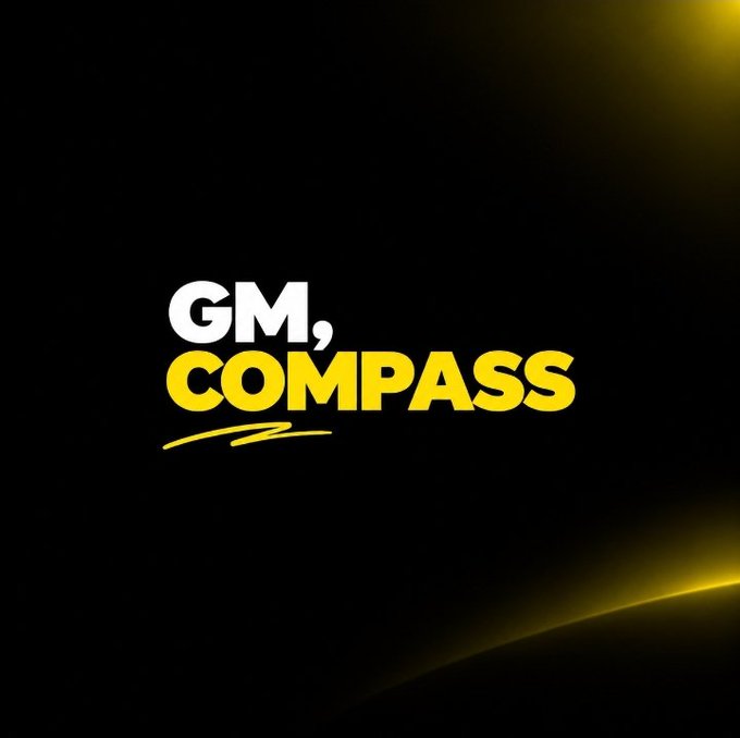 A black background features the text 'GM, COMPASS' in white and yellow lettering, accented with a yellow underline and golden light flares.