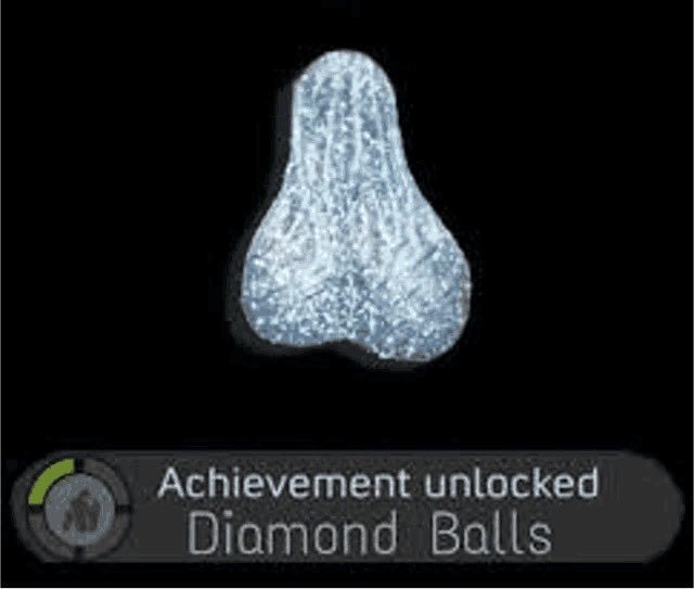 An Xbox achievement notification displays an icy crystal-shaped object with the text 'Achievement unlocked Diamond Balls'.