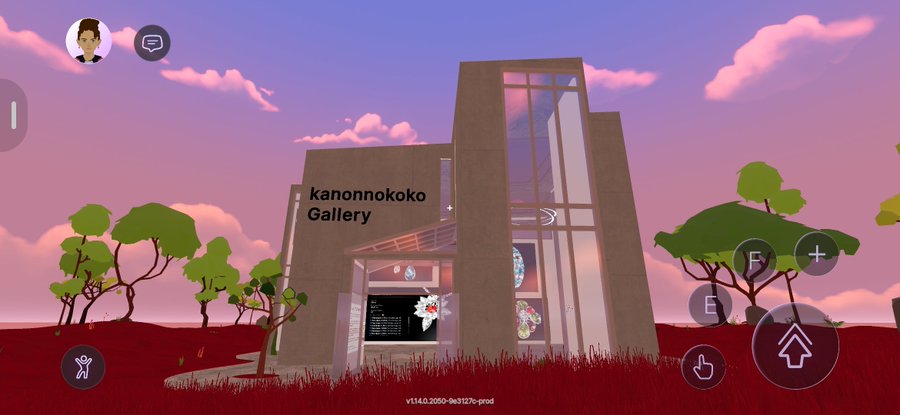 A screenshot from a virtual gallery platform showing a modern building labeled 'kanonnkoko Gallery' set against a sunset sky with pink clouds, featuring a VR/movement interface overlay.