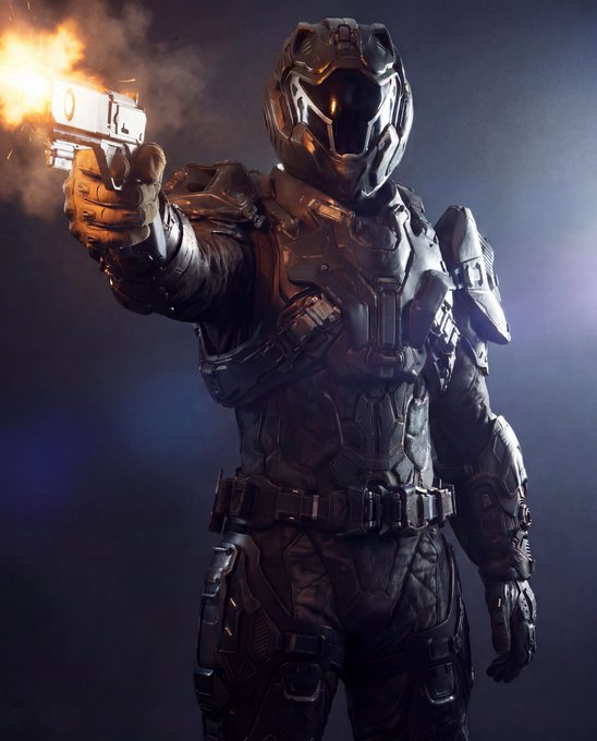 The image features a man dressed as a robot or cyborg with a gun pointed at him. He appears to be posing for a photo, possibly in front of a dark background that could represent a futuristic setting. The caption above the image reads "Looking for adventure and everything comes our way, Born to be $WILD, GM CT". This suggests that the man is likely dressed as a robot or cyborg for an event or convention related to science fiction, technology, or futuristic themes.