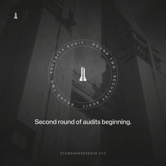 A dark, atmospheric graphic with the text "Second round of audits beginning." and "STANDRESERVE.XYZ" along with a circular "SECURITY AUDIT - ROUND TWO" emblem.