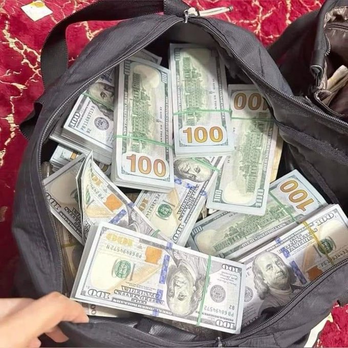 A duffel bag is stuffed full of bundled $100 bills stacked in neat piles.

The image of a bag overflowing with stacks of $100 bills serves as a flashy visual symbol of wealth and potential gains, fittingly paired with the post's pitch about Sleepagotchi's infrastructure layer that unlocks value from fragmented health data.
