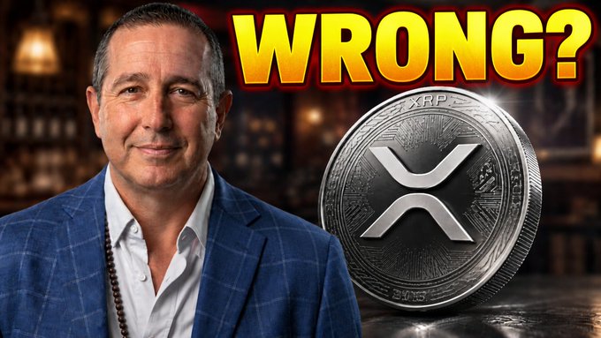 A YouTube thumbnail featuring a man in a blue checkered blazer alongside a prominent silver XRP cryptocurrency coin, with the bold yellow text 'WRONG?' at the top.