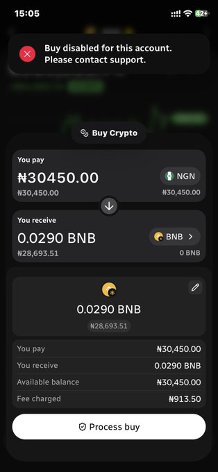 A mobile app screenshot showing a 'Buy disabled for this account' error message above a crypto purchase screen for ₦30,450.00 of 0.0290 BNB.