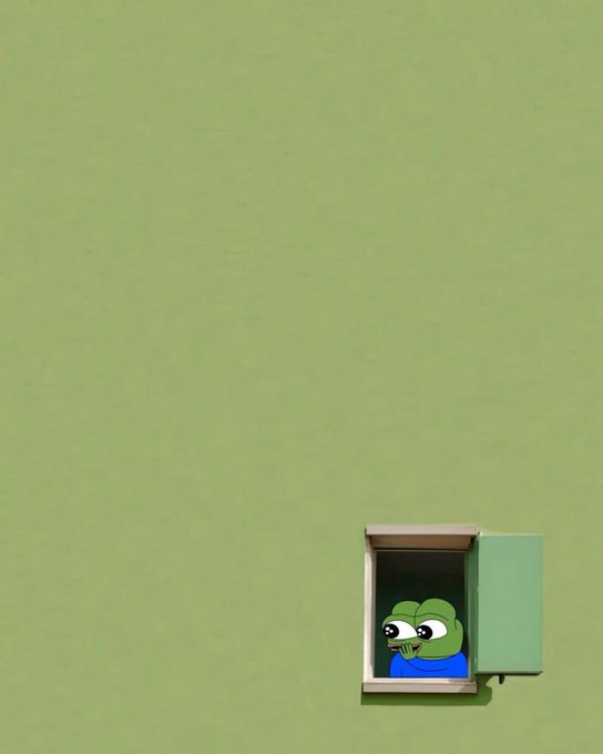 A small green cartoon frog character looks out from an open window set in a large plain green wall.