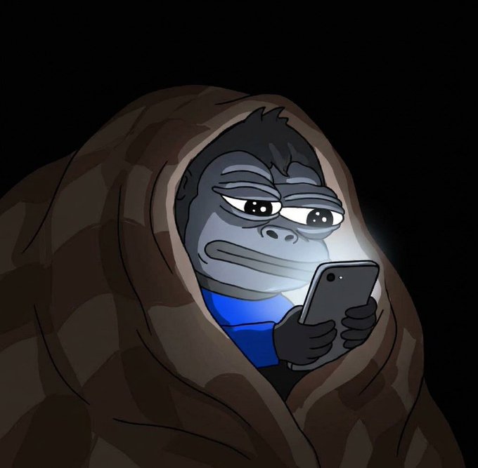 Illustration of a gorilla wrapped in a brown blanket, looking at a smartphone whose screen light illuminates its face in a dark setting.
