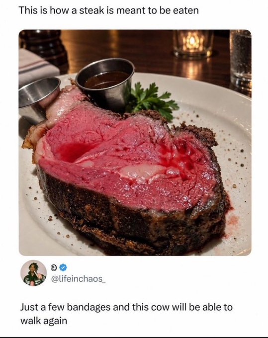 A tweet from @lifeinchaos_ showing a very rare, mostly raw steak with the caption 'This is how a steak is meant to be eaten' and the punchline 'Just a few bandages and this cow will be able to walk again'.