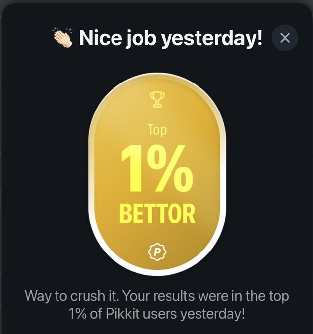 A notification screen celebrating a 'Top 1% BETTOR' achievement with text that reads 'Nice job yesterday! Way to crush it. Your results were in the top 1% of Pikkit users yesterday!'