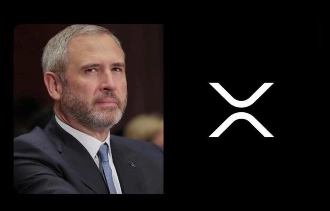 The image features a man wearing a suit, sitting down with his hands clasped together. The background of the image is black, which contrasts with the white logo that reads "XRP" at the top center of the frame. The caption below the image states that Ripple CEO Brad Garlinghouse says XRP is set to overtake Bitcoin.