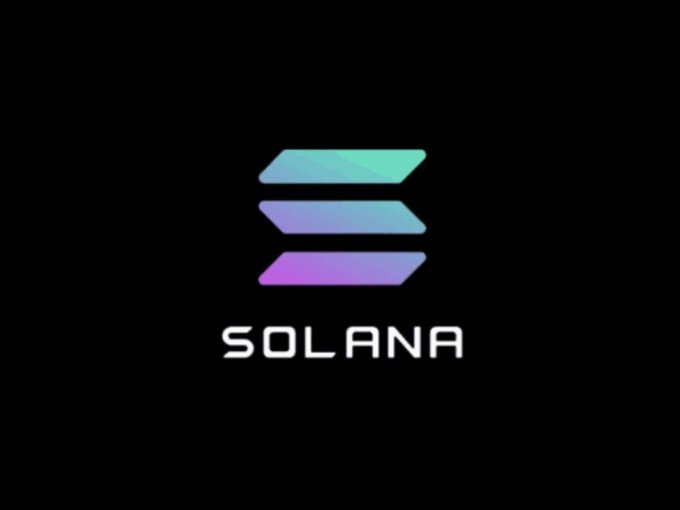 The image shows a logo featuring a purple, teal, and blue triangle, which is part of an "S" or "s." The letter "O" from within the triangle also has purple, teal, and blue colors. The background of the image is black, making it stand out. There's text in the picture that reads: 
"$120 Solana Giveaway Solradarx Follow @Solrdarx Like & RT Drop your $SOL address 48H".