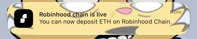 A notification banner with cartoon imagery reading "Robinhood chain is live. You can now deposit ETH on Robinhood Chain."