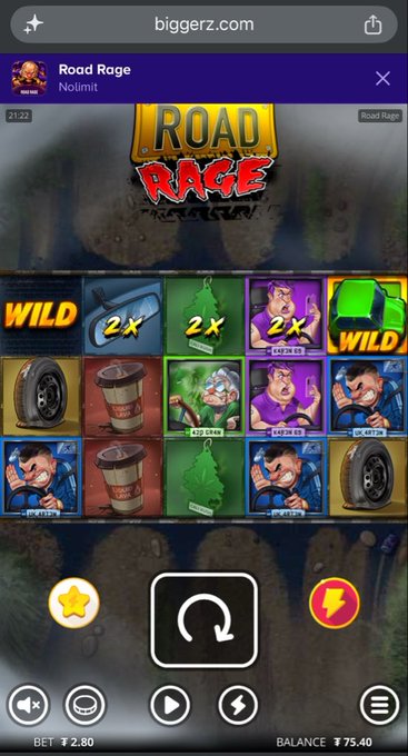 A mobile screenshot of a 'Road Rage' slot machine game from biggerz.com featuring cartoon character symbols like a mechanic, woman, and tires, with betting and balance controls visible.