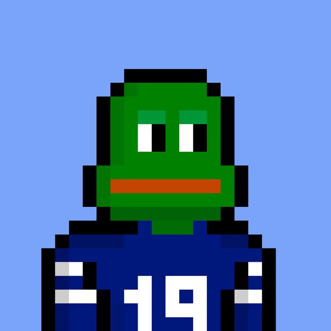 A pixelated green frog-like character with a red mouth wears a blue jersey displaying the number "19" against a light blue background, fitting the "nakamigos" (Japanese friends) theme.