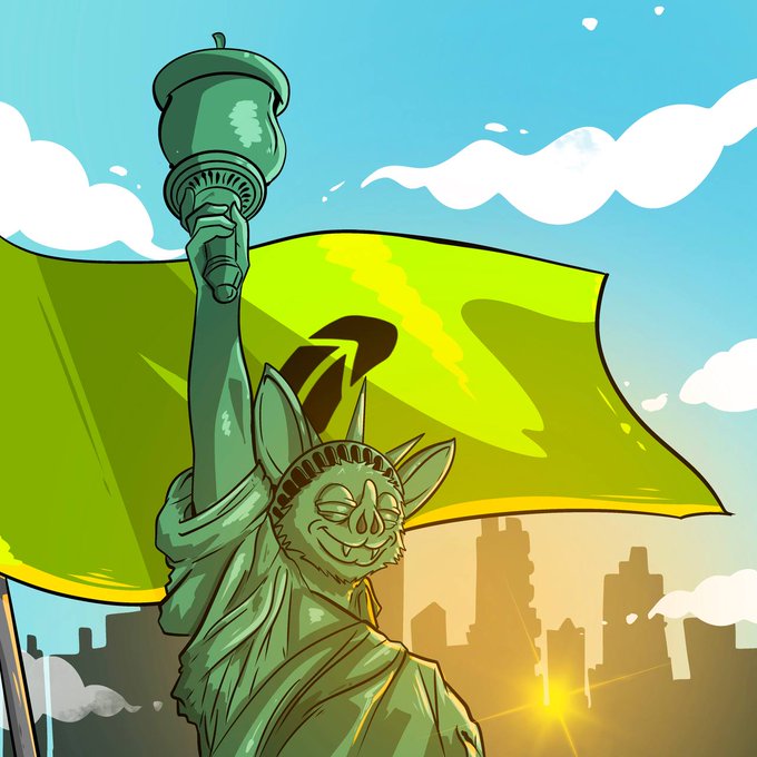 A green, cartoonish Statue of Liberty with a mischievous grin holds a torch alongside a large green flag bearing a black logo, set against a city skyline at sunset. The image reflects the "the future looks familiar" caption by blending a reimagined, meme-like Liberty with crypto-style branding, suggesting that cryptocurrency is becoming an iconic, recognizable symbol of the modern era.